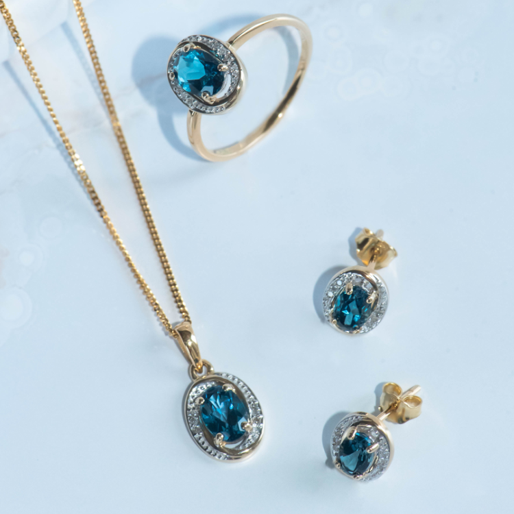 Bicolor gouden hanger met London Blue Topaas en Diamant