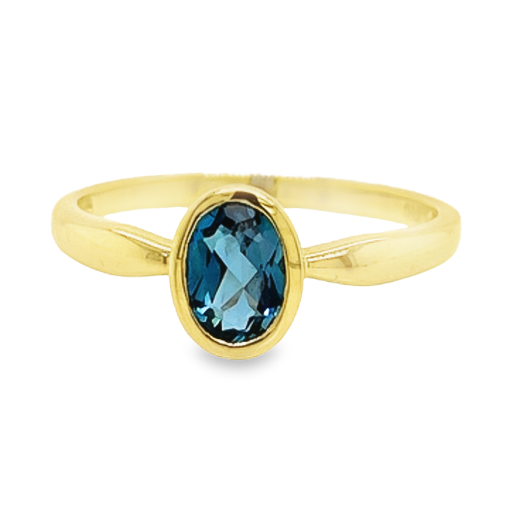 Geelgouden ring met kleursteen London Blue topaas