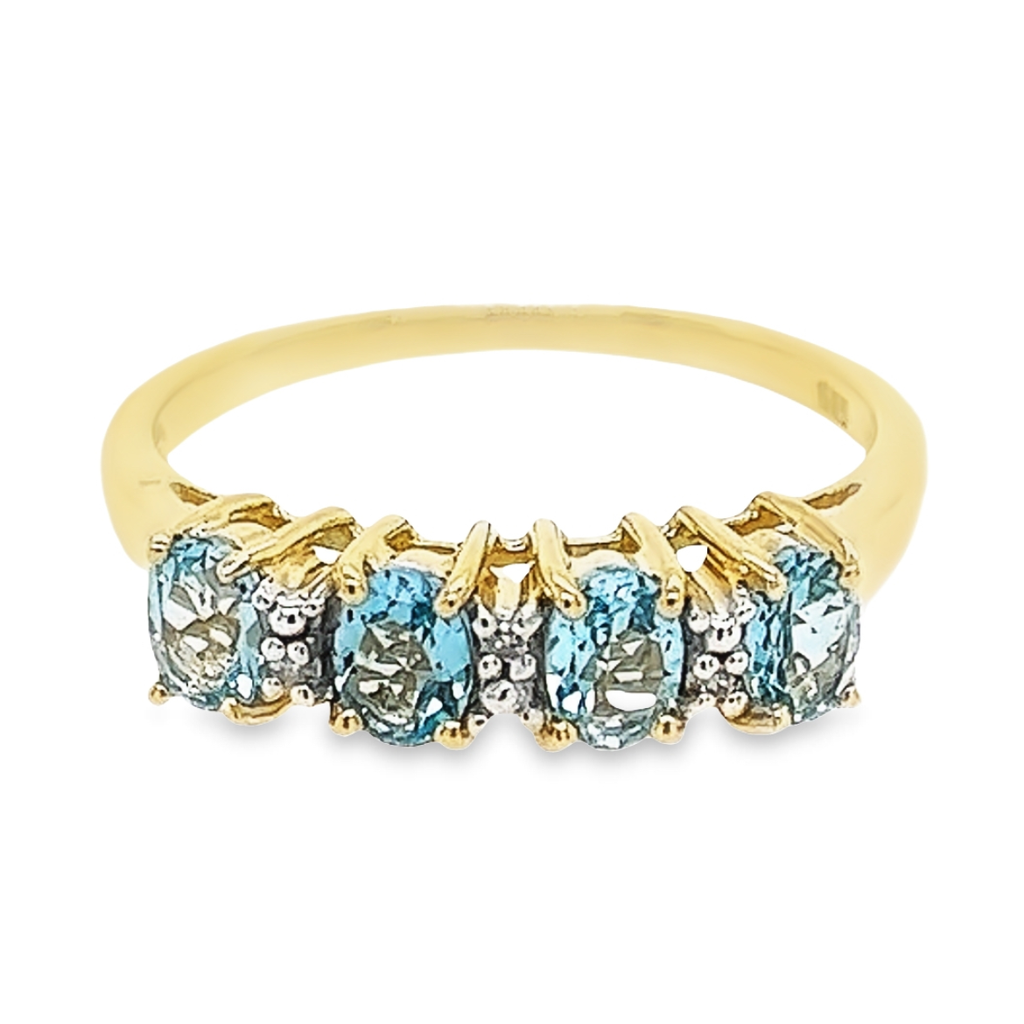 Yellow gold ring with Swiss Blue Topaz and Diamond