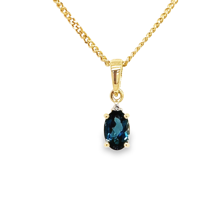 Yellow gold pendant with London Blue Topaz and Diamond