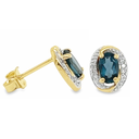 Bicolor gouden oorstekers met London Blue Topaas en Diamant