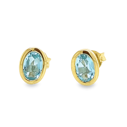 [GOE0950] Geelgouden oorknoppen met Sky blue Topaas